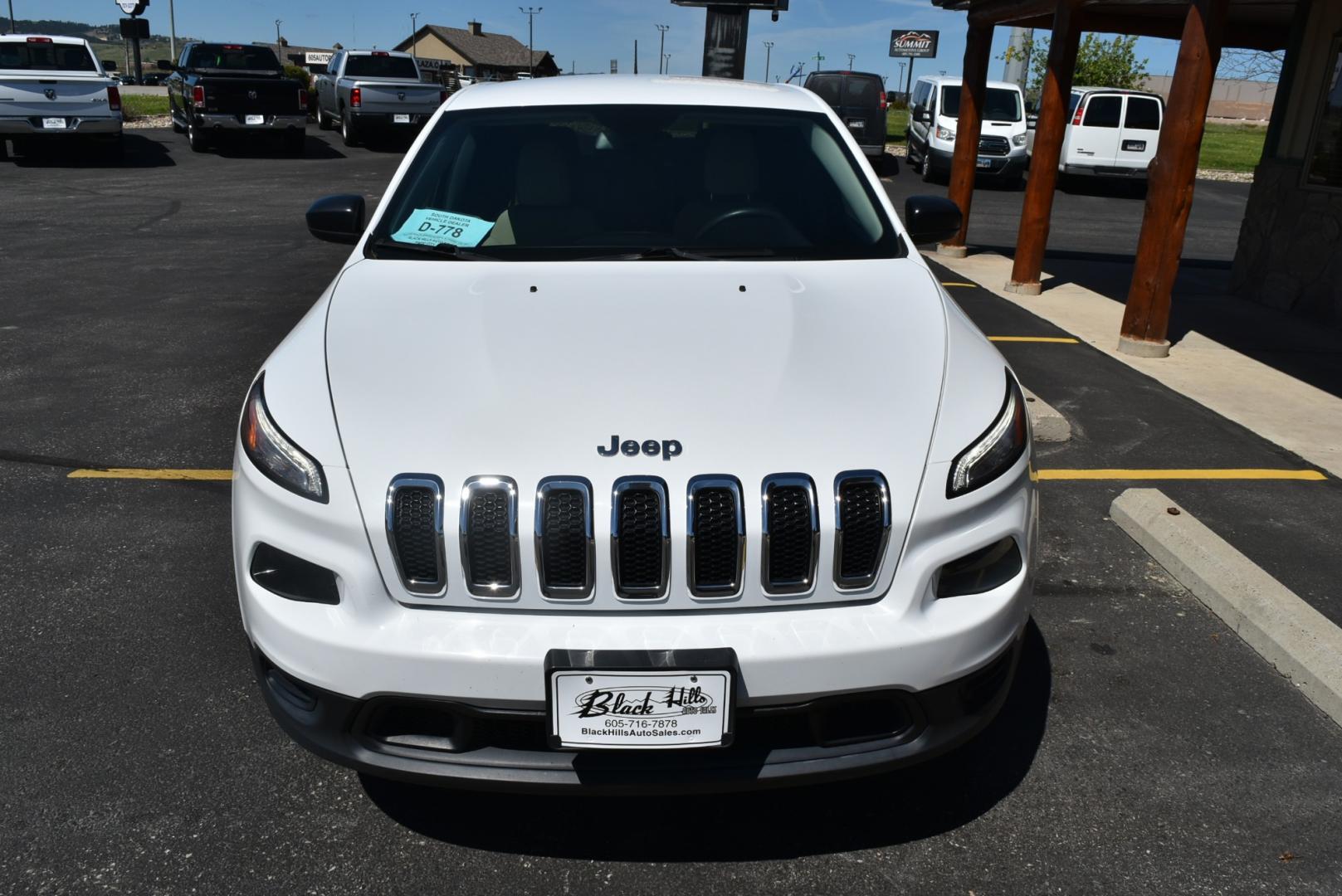 2016 White /Beige Jeep Cherokee Sport (1C4PJMAB4GW) with an 2.4L 4 Cyl Multi -Air engine, 9-Speed Automatic transmission, located at 1600 E Hwy 44, Rapid City, SD, 57703, (605) 716-7878, 44.070232, -103.171410 - Photo#1